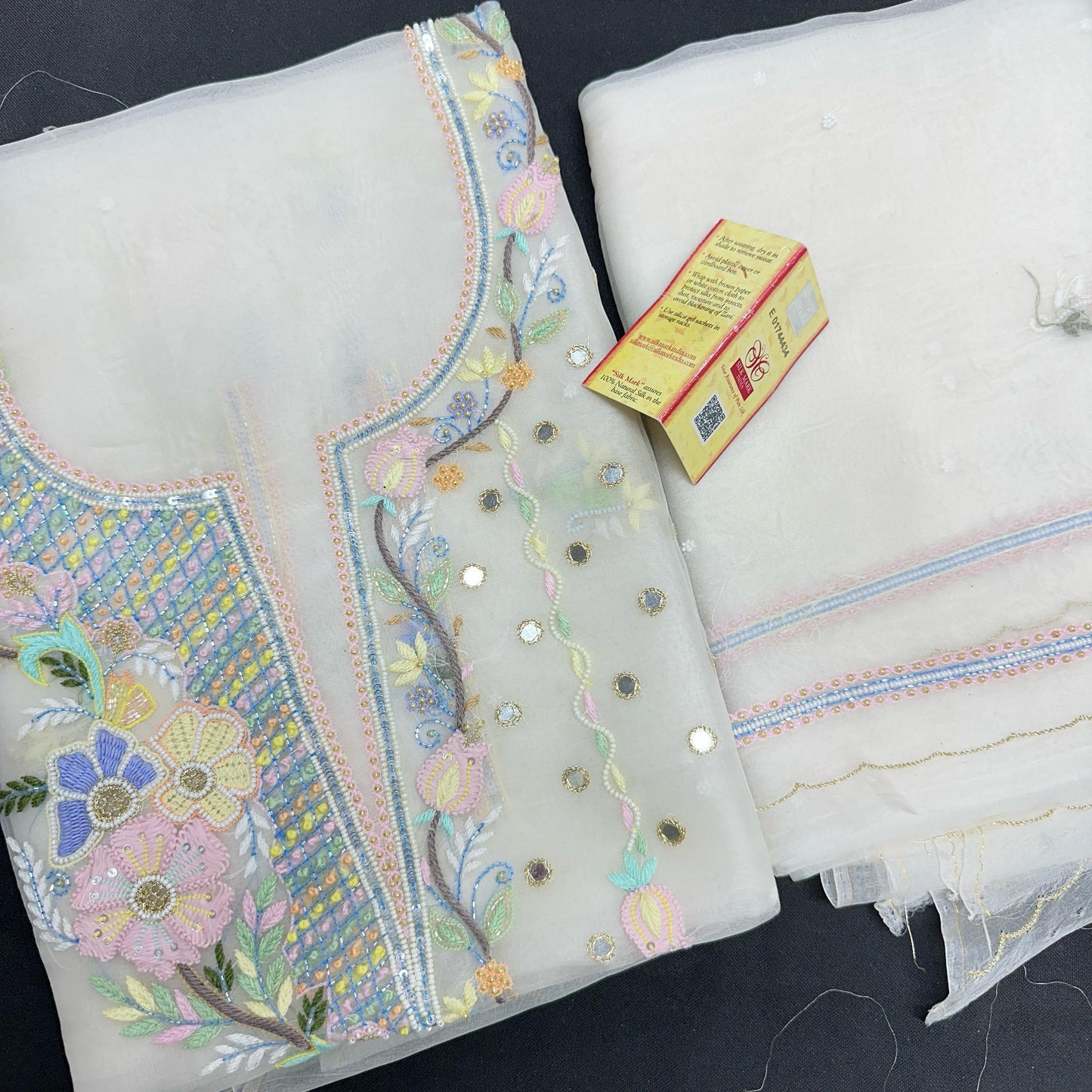 Pearl Garden – Dyable White Organza Silk Set with Multicolor Parsi Shadow & Floral Neck Embroidery